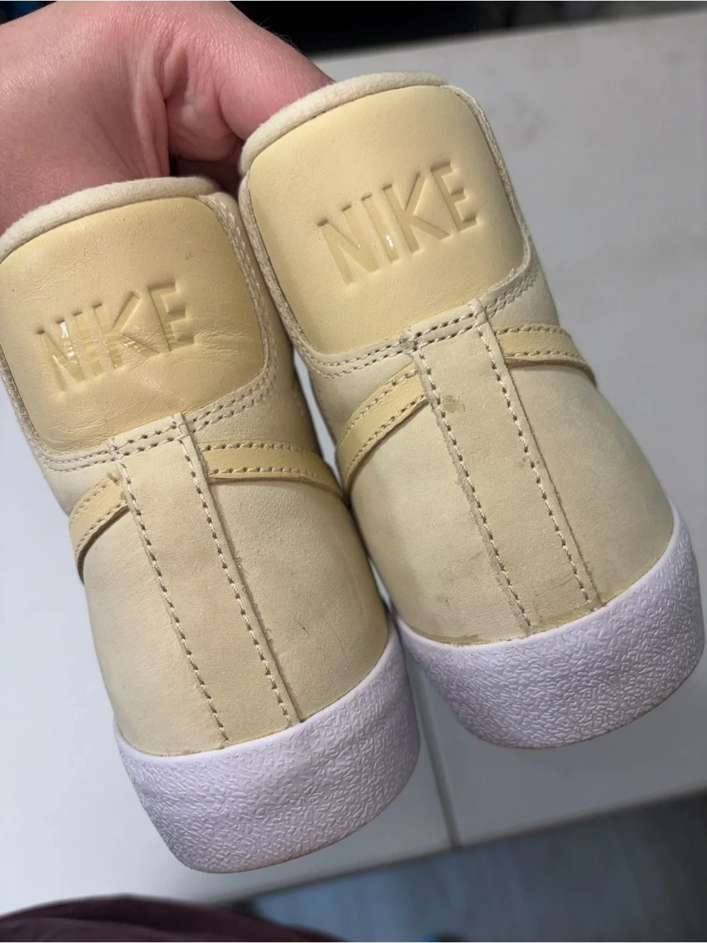 Nike Women’s High-Top Sneakers in Pale Yellow and White